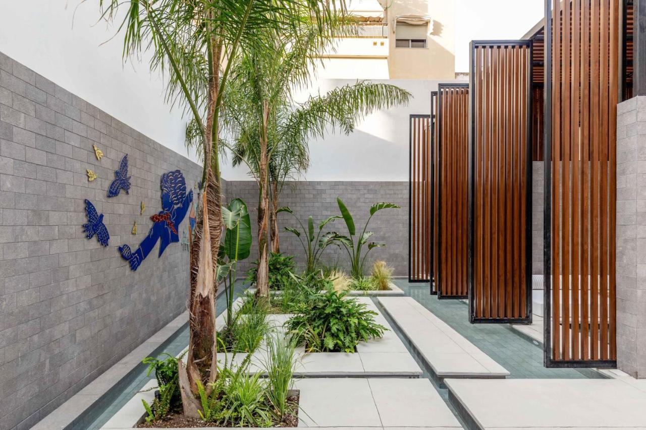 Hotel The Newel Psychiko Athen Exterior foto The courtyard of the museum